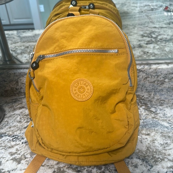 Kipling Handbags - Kipling Gold Backpack